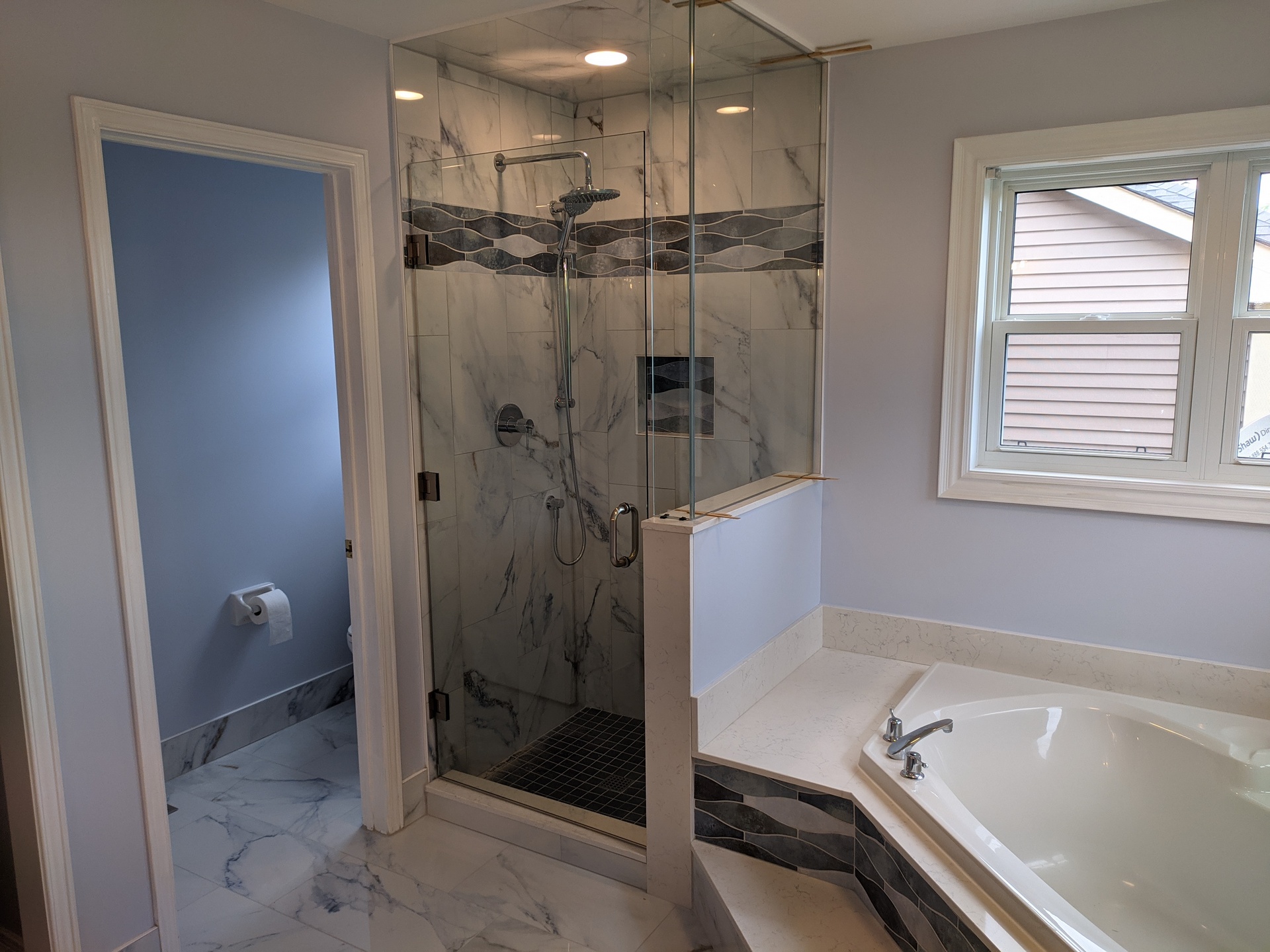 Calacatta blue porcelain tile installation